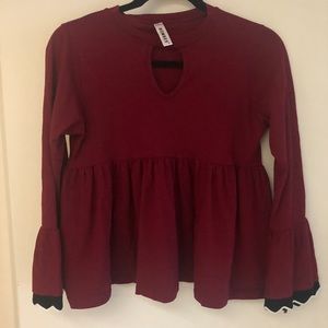 Adorable top with peplum